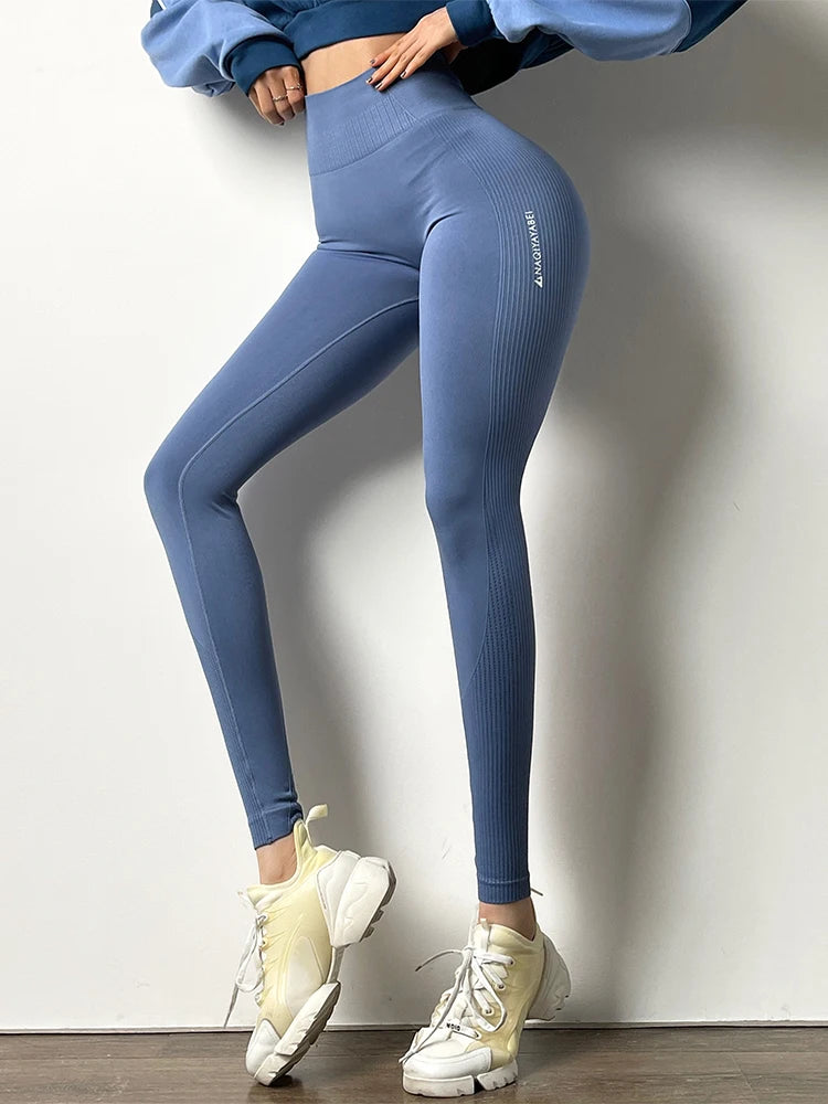 KiKis blue High Waist Push Up Seamless Leggings worn with white sneakers and a blue cropped sweatshirt