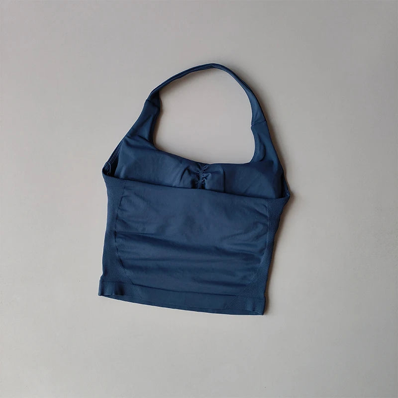 KiKis navy blue halter neck sports bra for women with a sleek and supportive design
