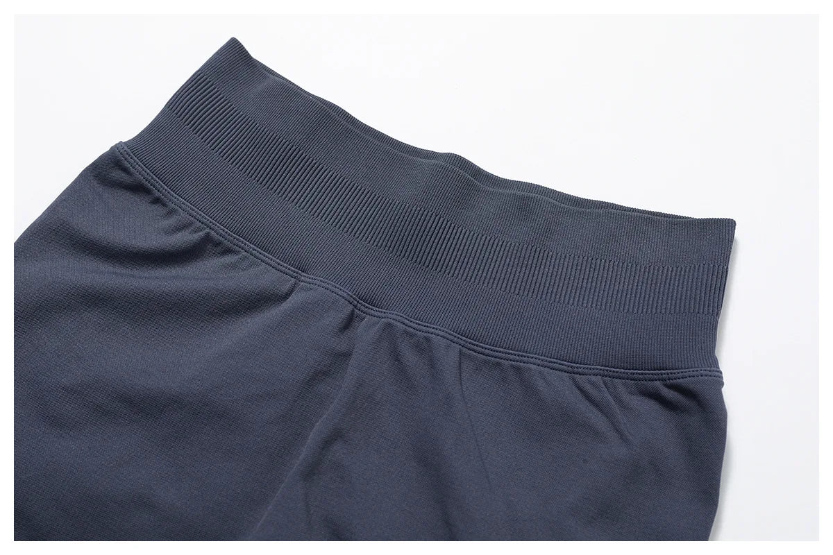 Close-up of waistband detail on KiKis women's seamless gym set in dark color