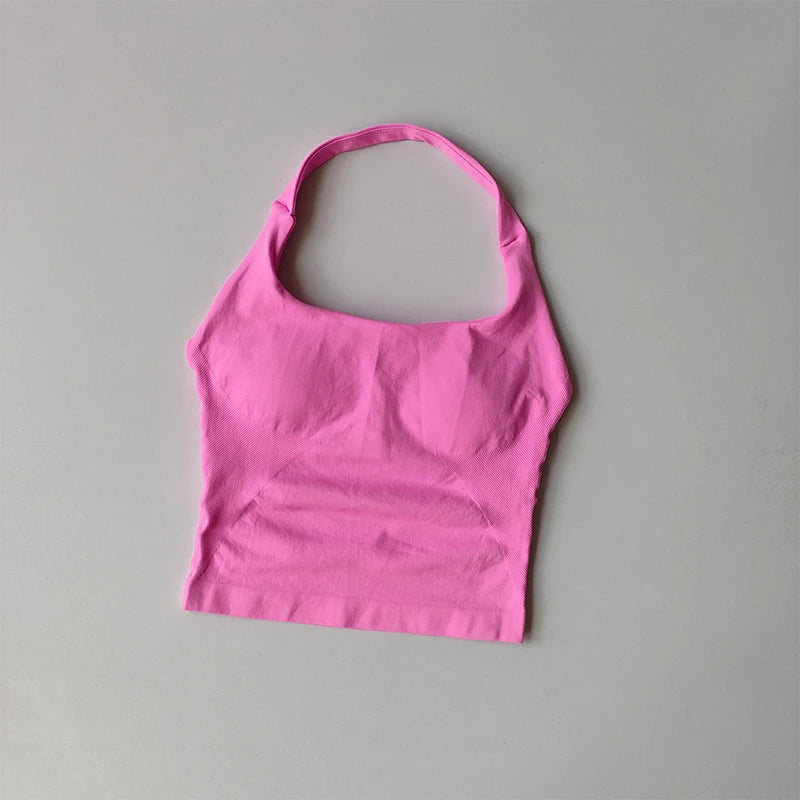 Pink halter neck sports bra for women with a smooth, seamless design by KiKis