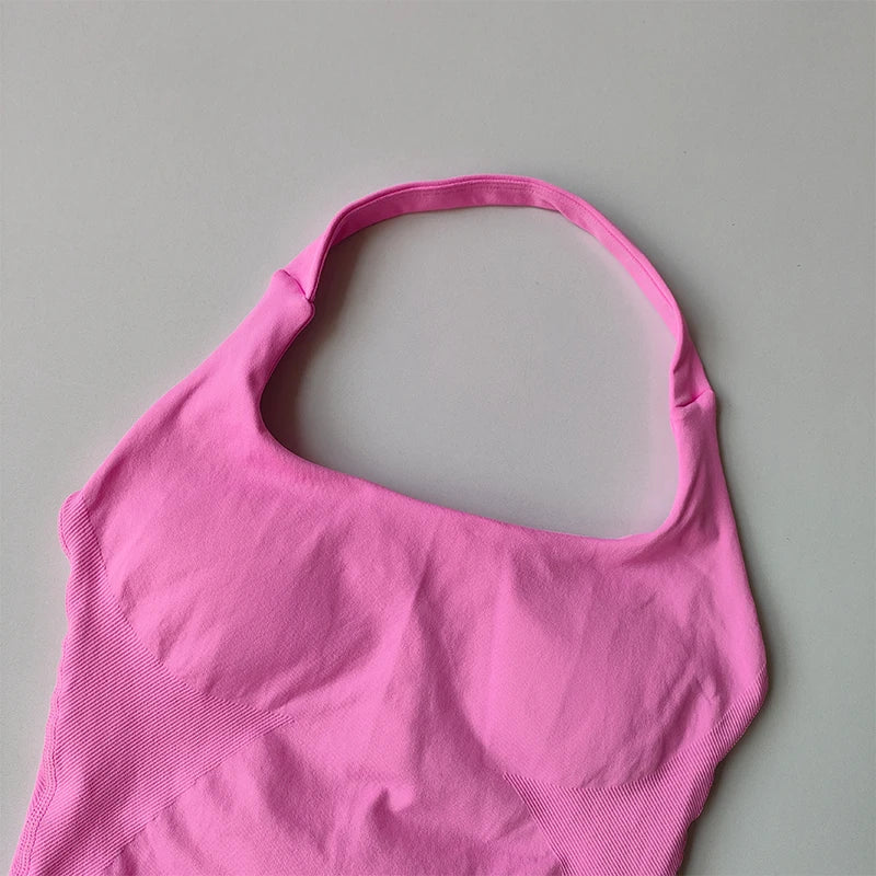 KiKis pink halter neck sports bra for women with seamless design and comfortable fit