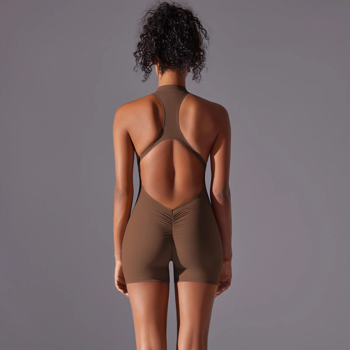 KiKis brown backless gym bodysuit for women with sleeveless design and open back