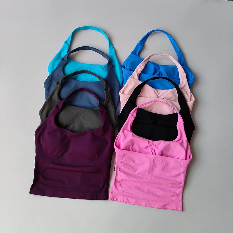 KiKis halter neck sports bra for women in multiple colors including pink, black, purple, blue, and grey