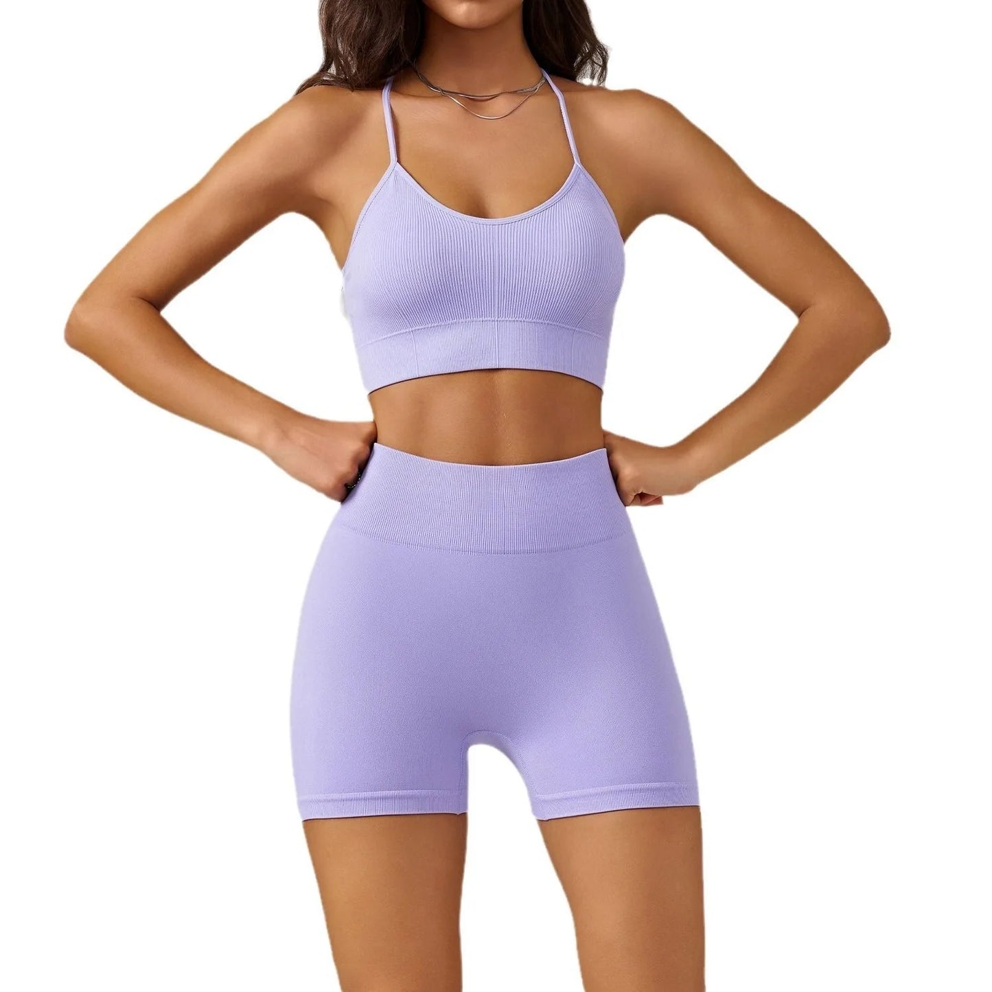 KiKis women's seamless gym set in light purple with a crop top and high-waisted shorts