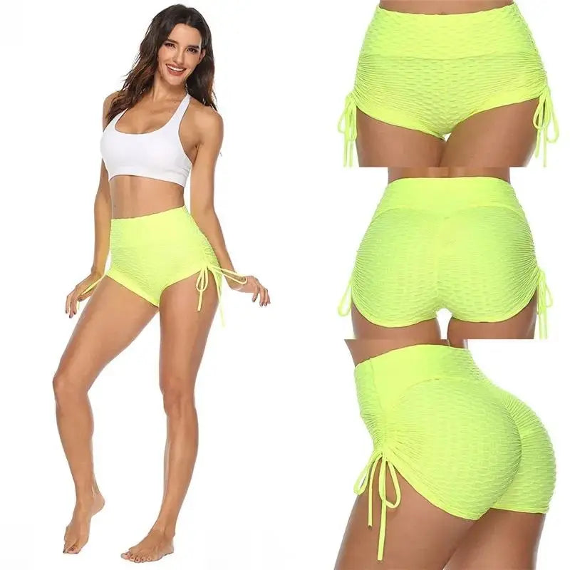 KiKis neon yellow push up sport shorts women with ruched sides and textured fabric