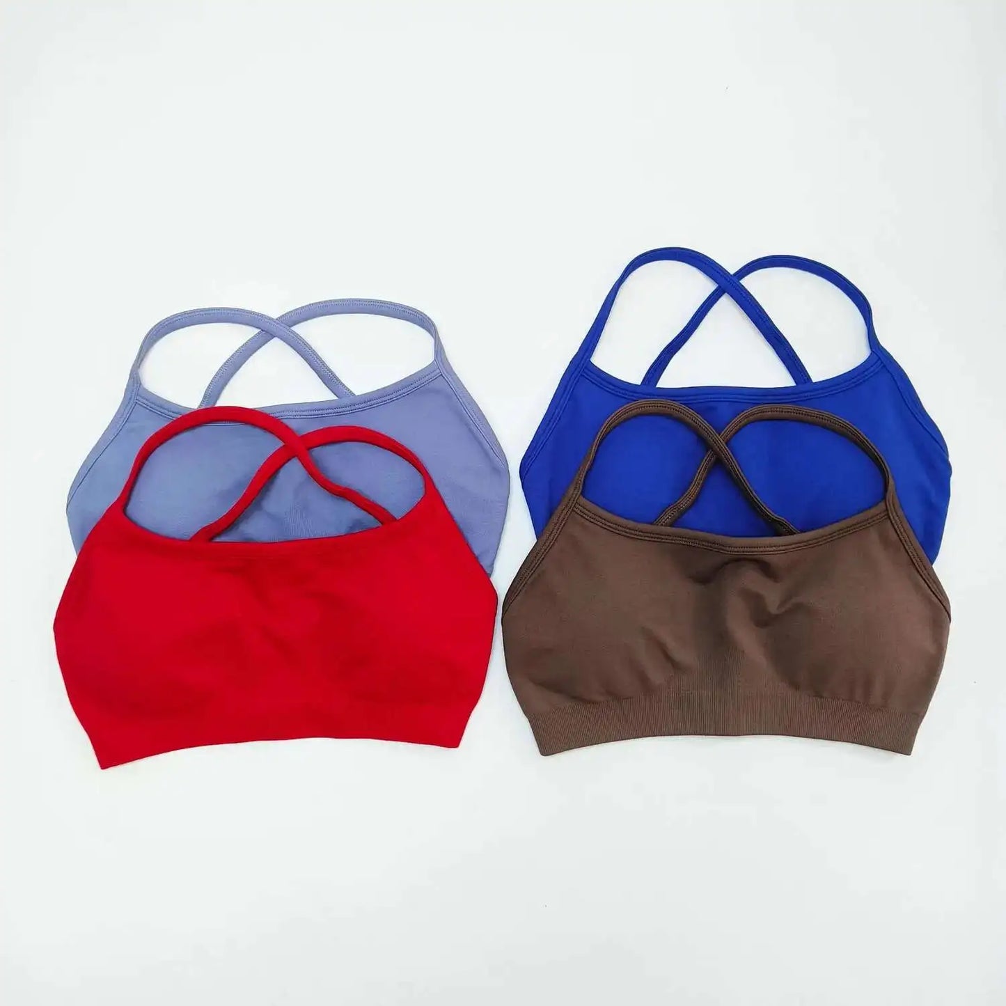 KiKis seamless sports bra for women in red blue brown and lavender with crisscross straps