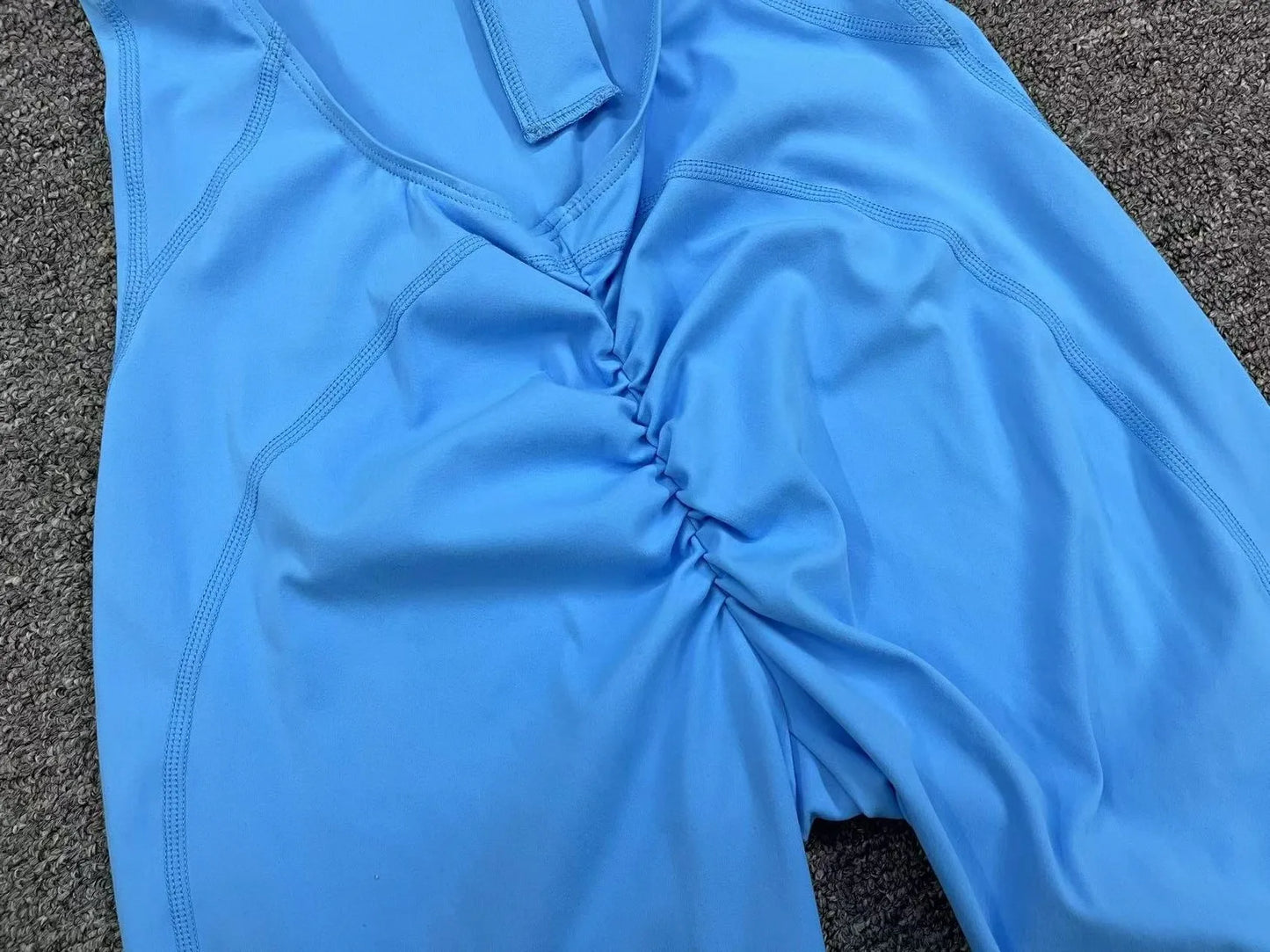 Sleeveless Workout Romper with Open Back Design