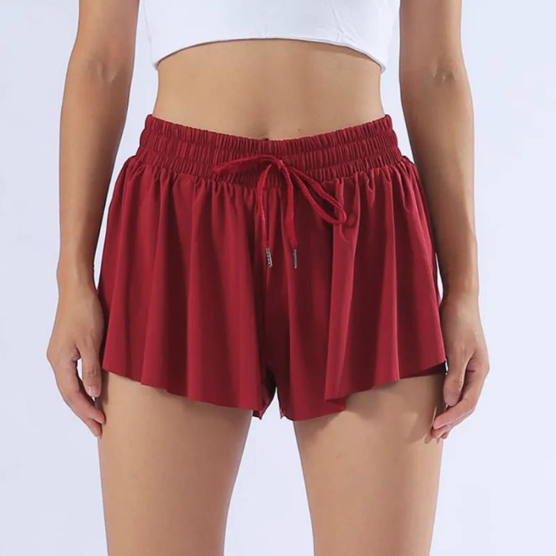 KiKis yoga running skirt shorts for women in maroon with elastic waistband and drawstring