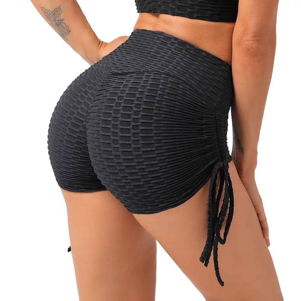 KiKis black textured push up sport shorts women with ruched sides and high-waist design