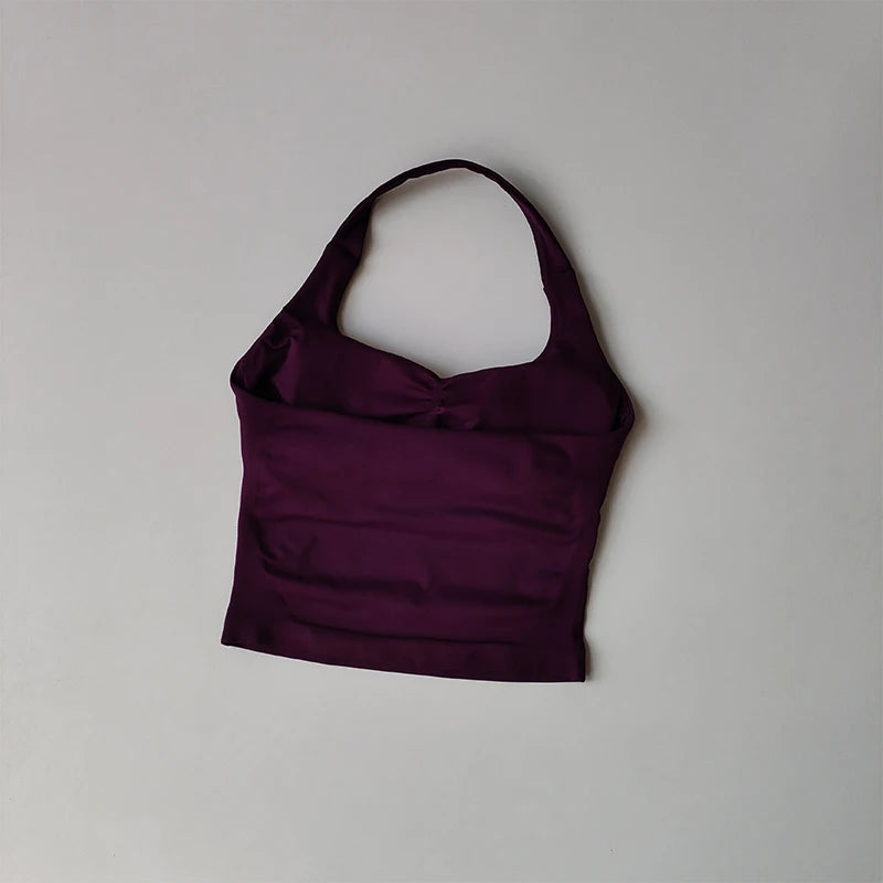 KiKis halter neck sports bra for women in deep purple with a smooth, fitted design