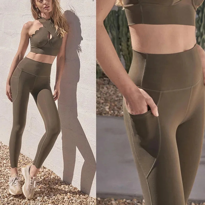 KiKis long sleeve lace back yoga top worn with high waist olive leggings featuring side pocket