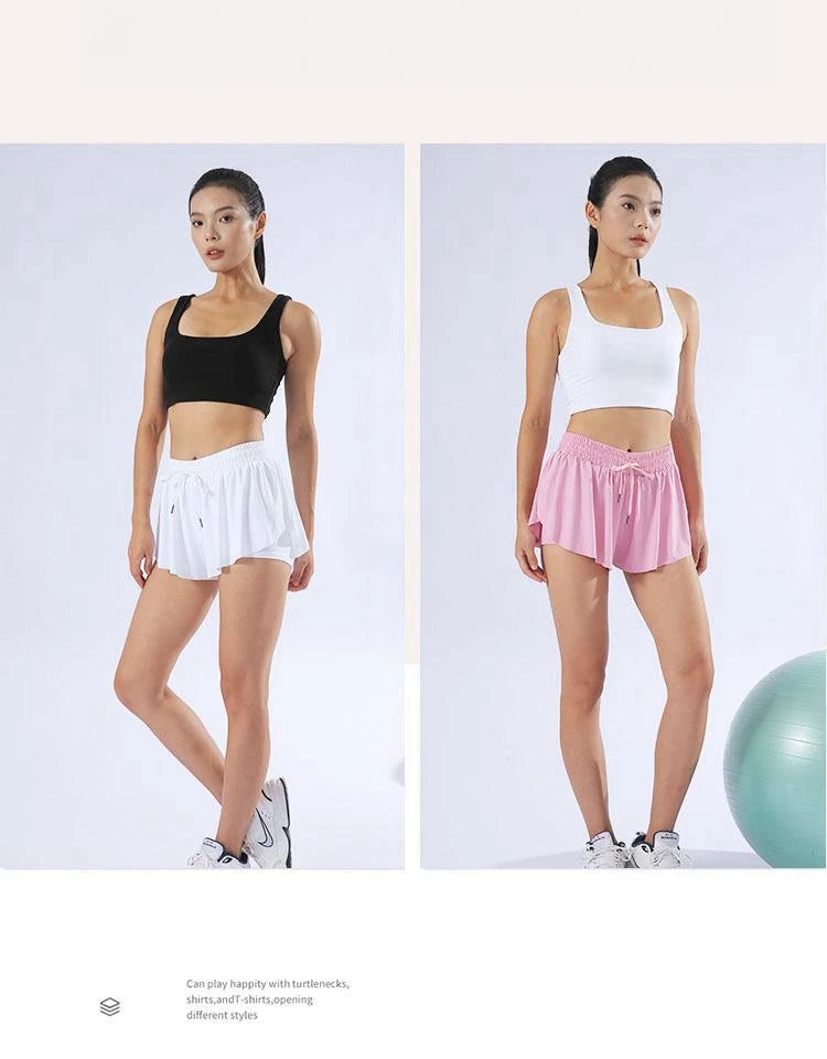 Women wearing KiKis yoga running skirt shorts for women in white and pink with black and white crop tops
