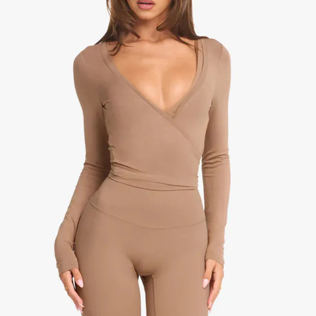 KiKis women's cross wrap yoga shirt in beige with long sleeves and deep V-neck design