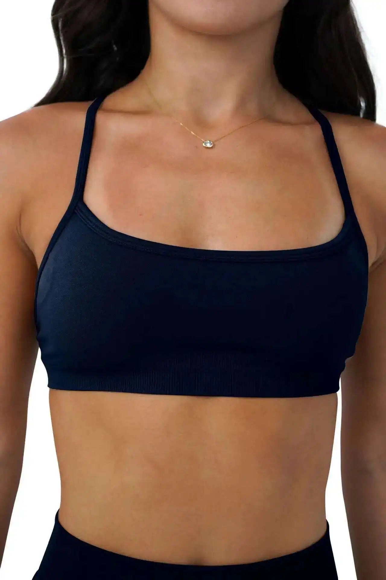 KiKis seamless sports bra for women in navy blue with thin straps and a smooth, fitted design