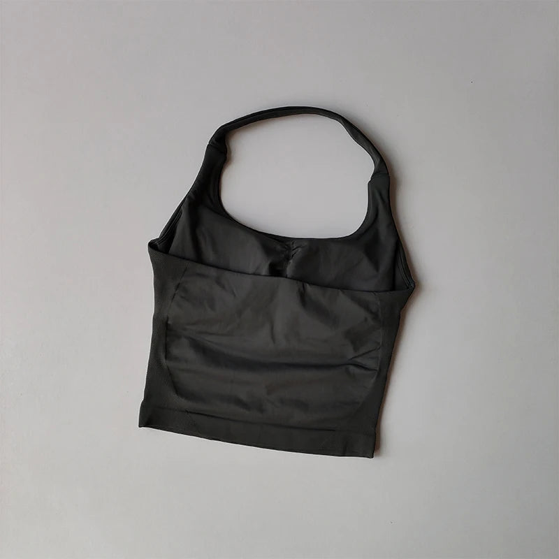 KiKis black halter neck sports bra for women with a sleek and smooth finish