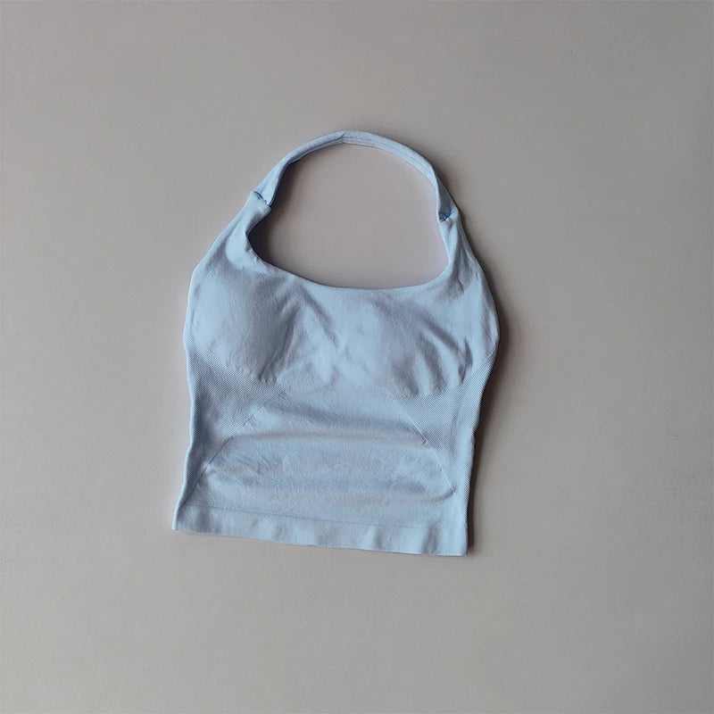 Light blue halter neck sports bra for women by KiKis with seamless design and soft fabric
