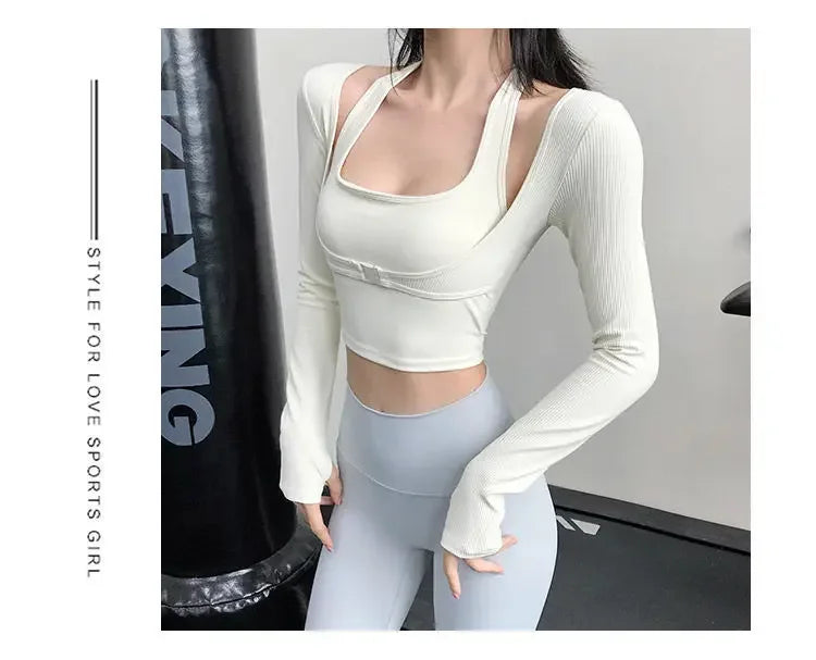 KiKis sexy women's yoga crop top in white with long sleeves shown worn with light blue leggings