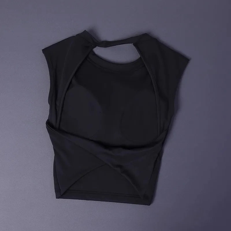 KiKis black women's backless sports tank top laid flat on gray background