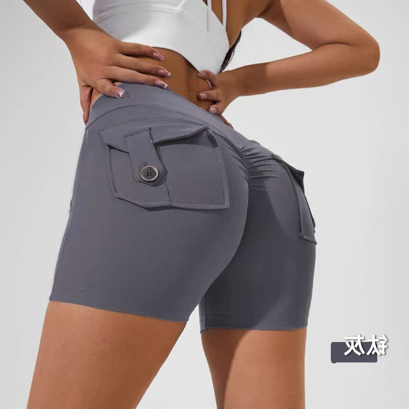 KiKis women's scrunch booty shorts in gray with buttoned back pockets and ruched detailing