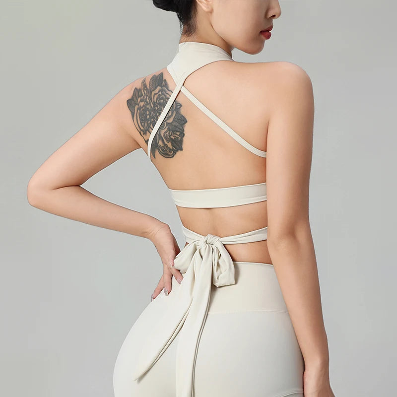 KiKis comfortable workout tank tops for women in beige with stylish back straps and tie detail
