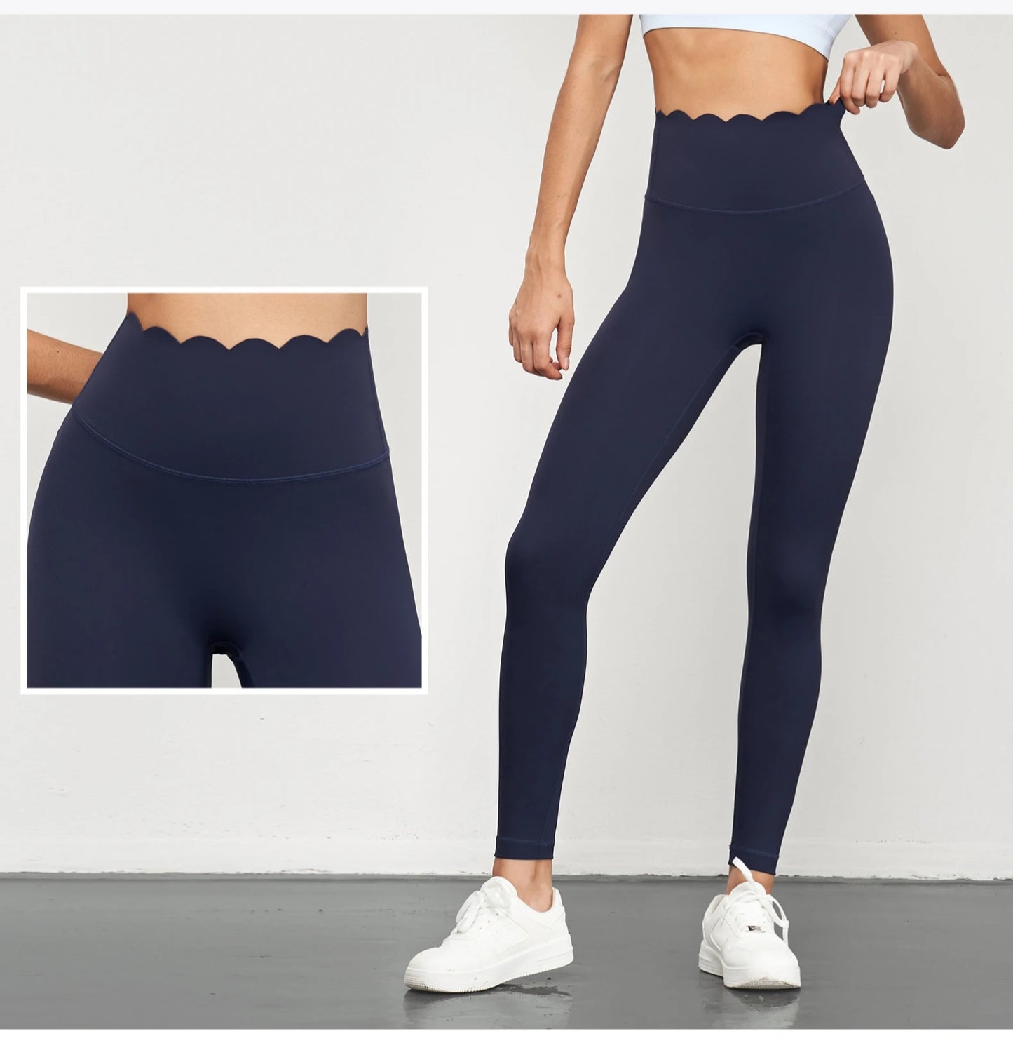 Women wearing KiKis Women Seamless Lotus Arc Yoga Pants in navy blue with scalloped high waist design