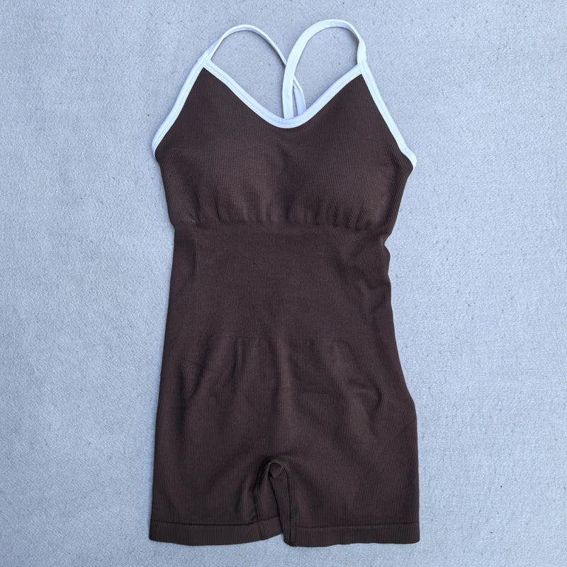 KiKis brown cross back strappy jumpsuit with white trim and fitted design