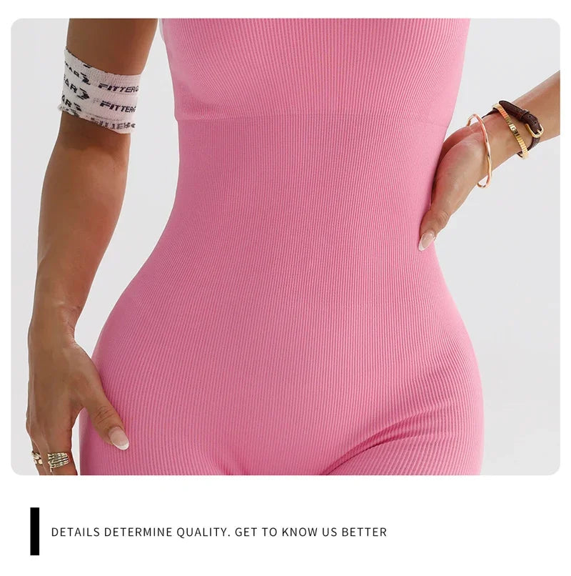 Close-up of pink cross back strappy jumpsuit by KiKis showing fitted ribbed fabric and details