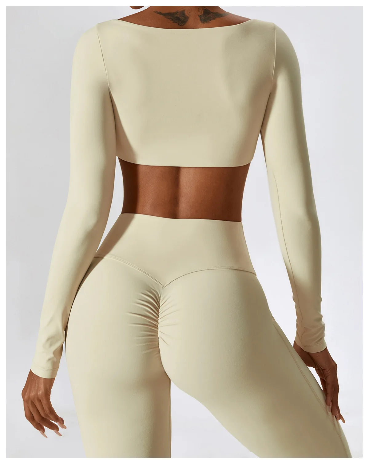 Beige long sleeve 2 piece workout set for women with high-waisted leggings and cropped top