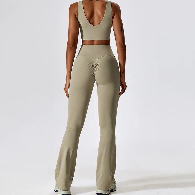 KiKis 2 piece workout set for women in olive green with high-waisted flared leggings and sleeveless crop top
