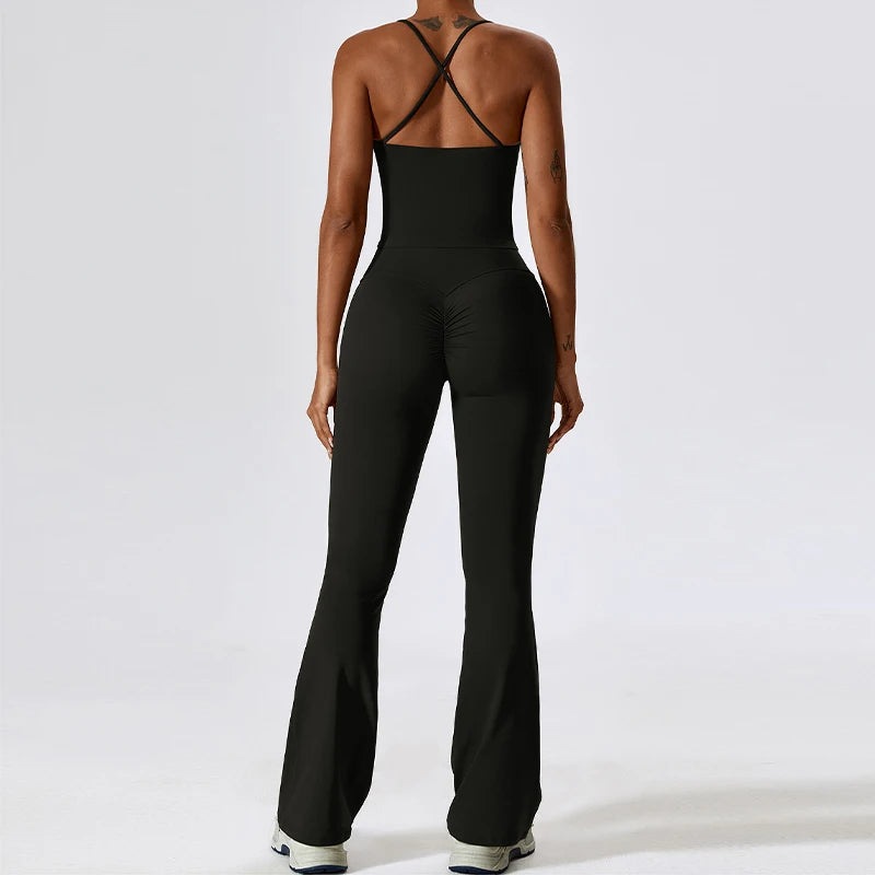 Back view of black 2 piece workout set for women with crisscross straps and flared leggings
