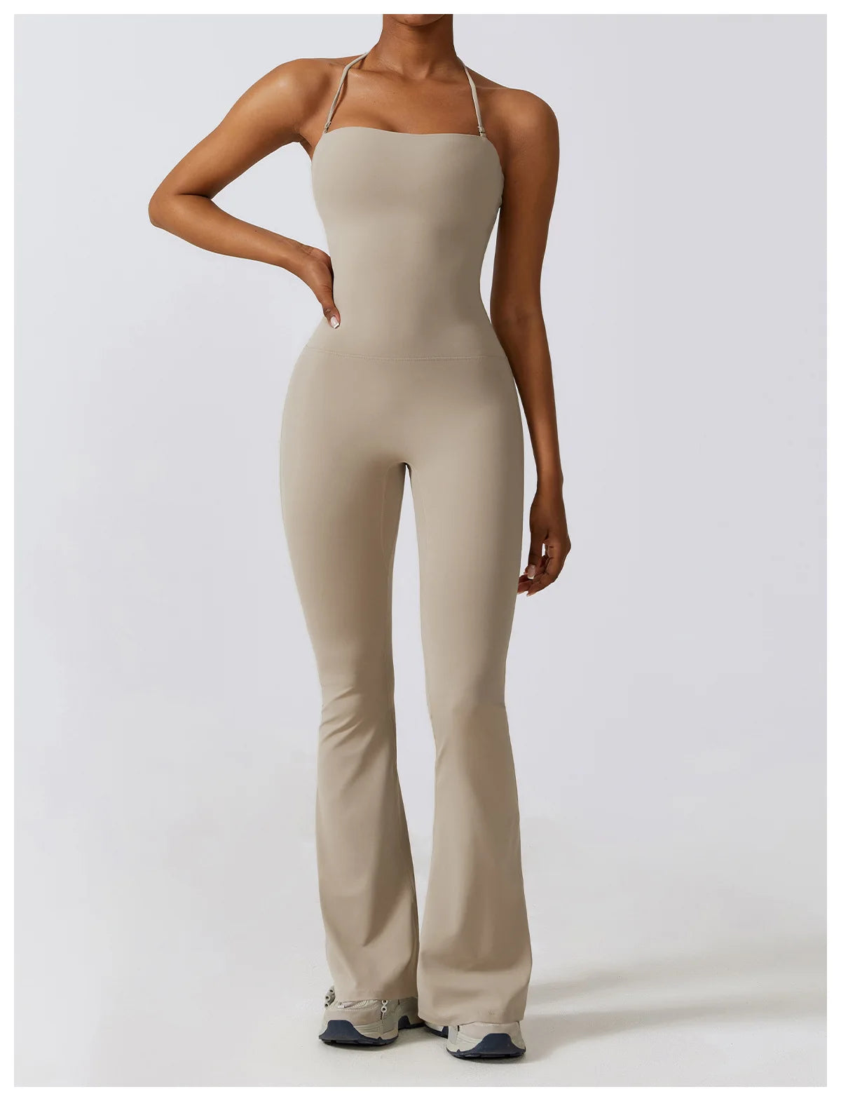 KiKis beige one piece yoga suit for women with thin straps and flared legs