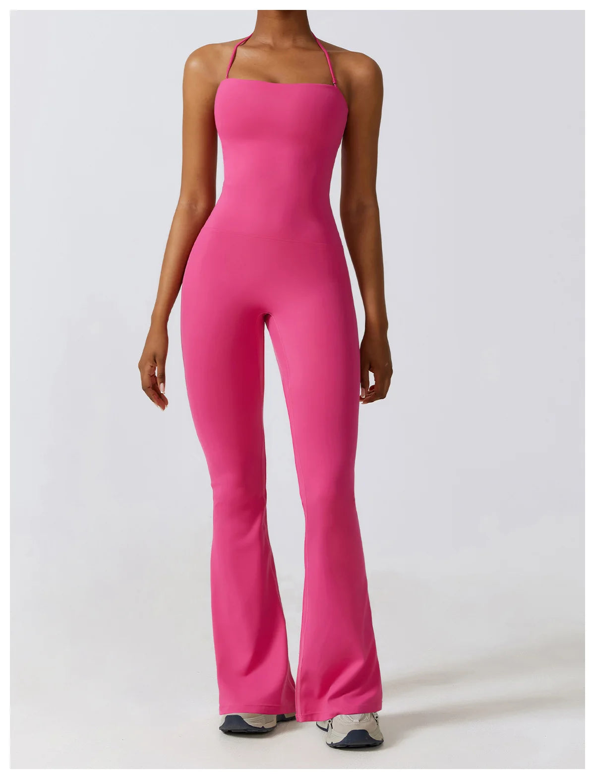 KiKis pink one piece yoga suit for women with spaghetti straps and flared legs