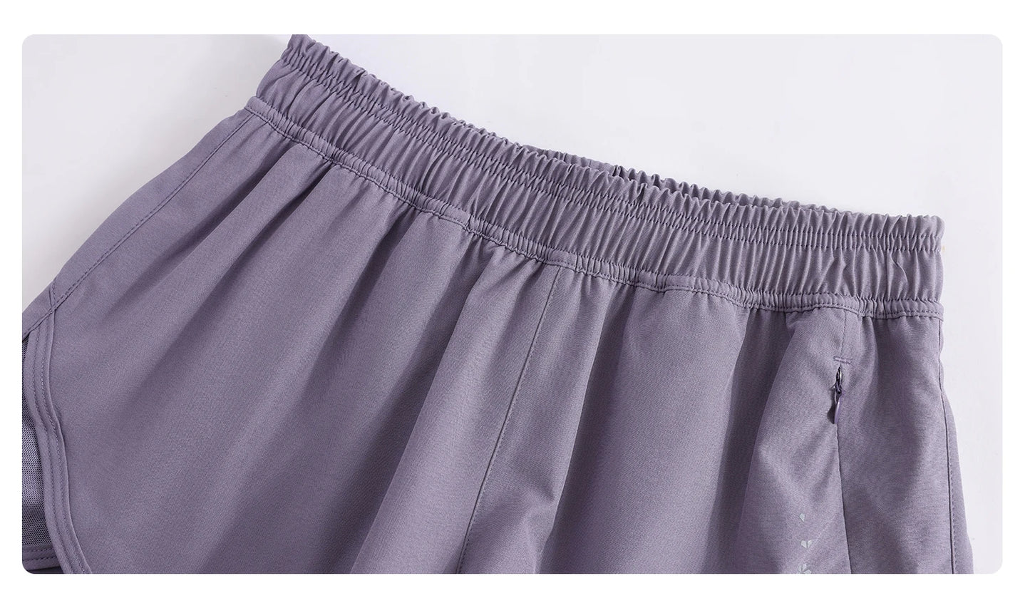 KiKis high waist running shorts for women in purple with elastic waistband and side pocket