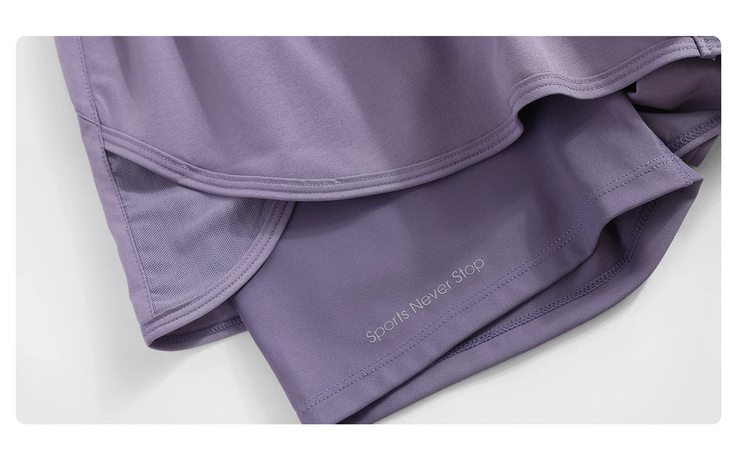 KiKis purple high waist running shorts for women with inner lining and sports never stop print