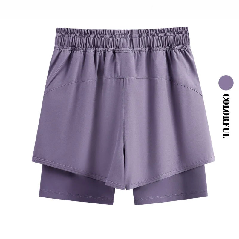 KiKis purple high waist running shorts for women with layered design and elastic waistband