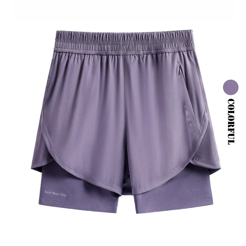 KiKis purple high waist running shorts for women with elastic waistband and layered design