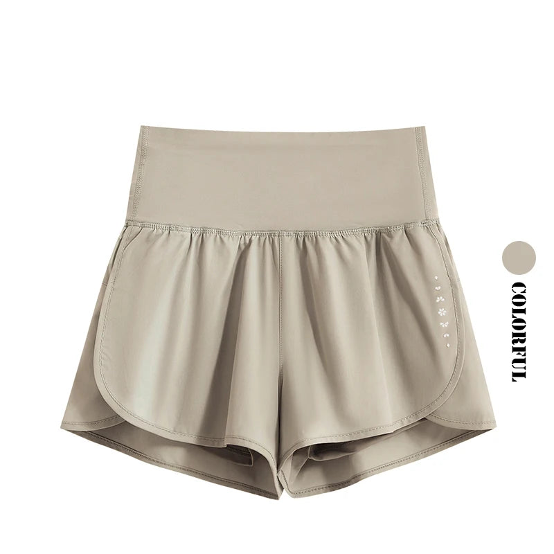 KiKis womens running shorts in beige with high waist and flowy design for comfort