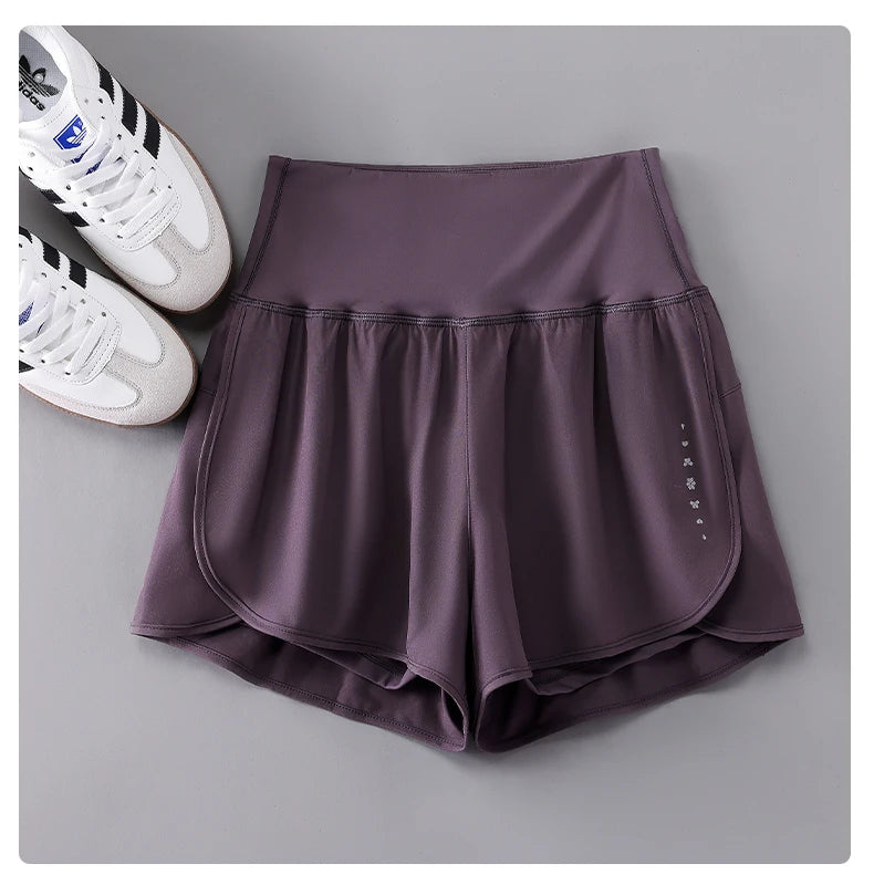 KiKis Womens Running Shorts in dark purple with high waist design and breathable fabric