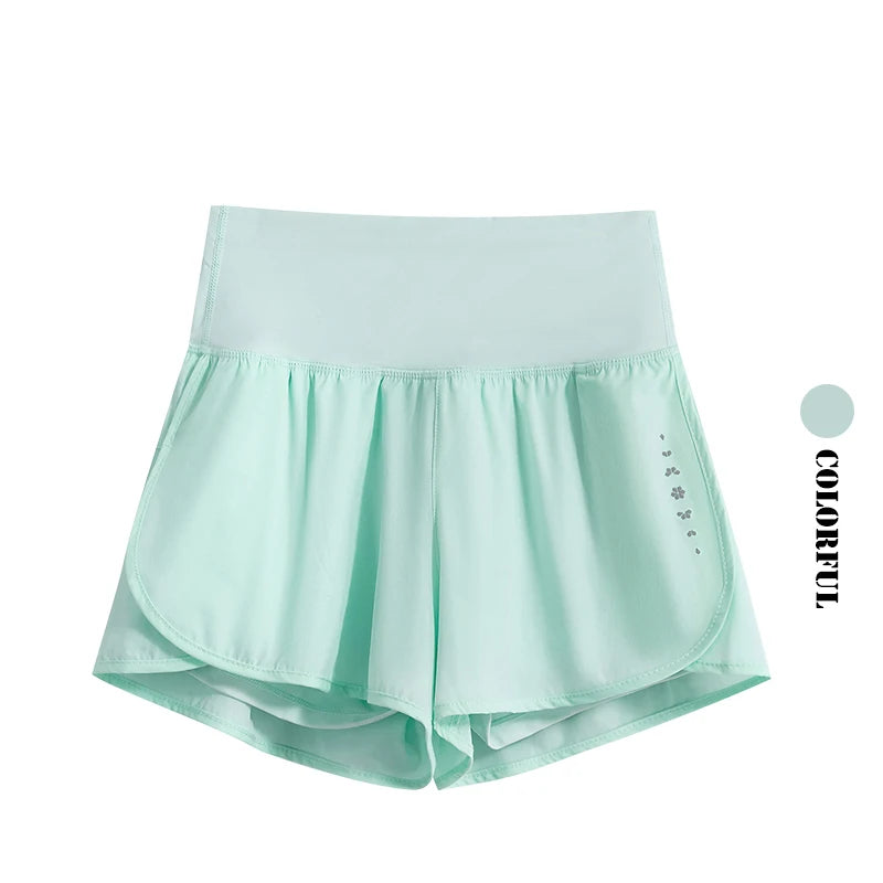 KiKis Womens Running Shorts in light blue with wide waistband and flowy fabric design