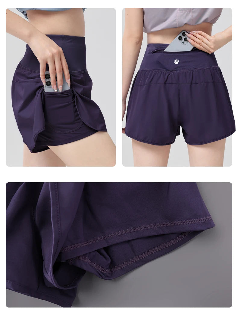 KiKis Womens Running Shorts in dark purple with built-in pockets for storing phone and essentials
