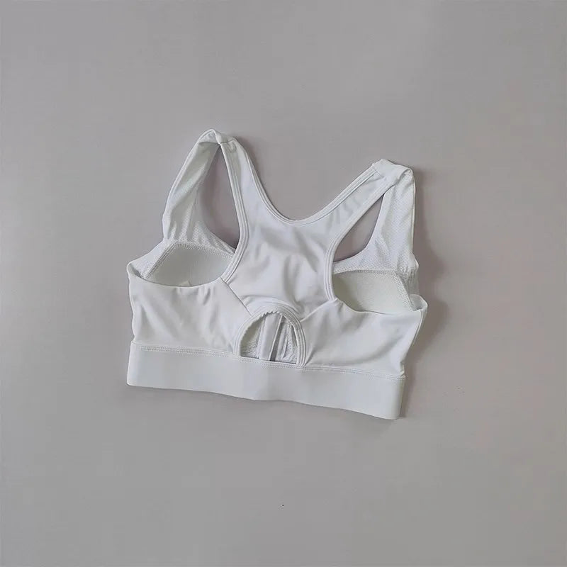 KiKis white high impact front zipper sports bra with racerback design and supportive band