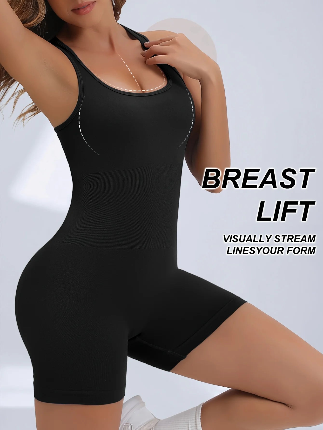 KiKis black women's workout jumpsuit with breast lift feature and sleeveless design
