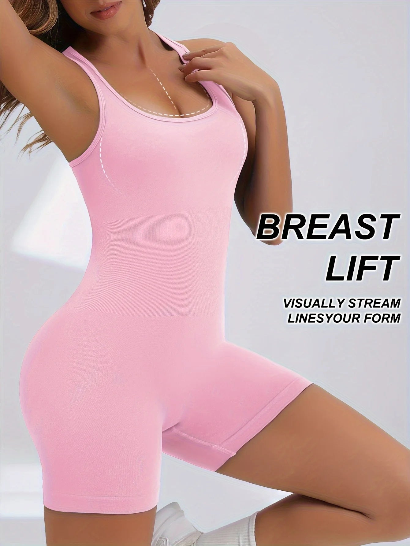 KiKis women's workout jumpsuit in pink with breast lift feature and form-fitting design