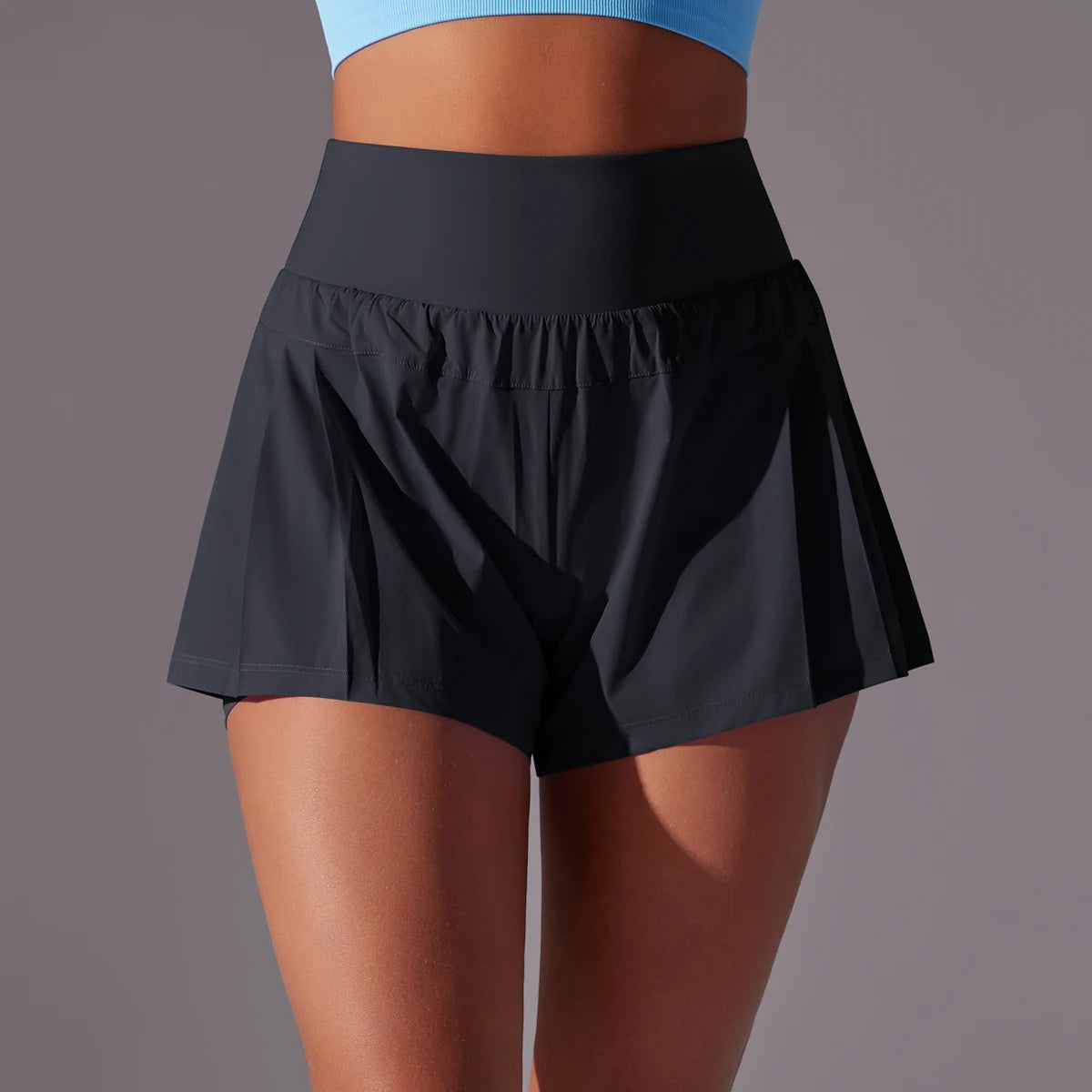 KiKis black high waist women's gym shorts with wide waistband and relaxed fit