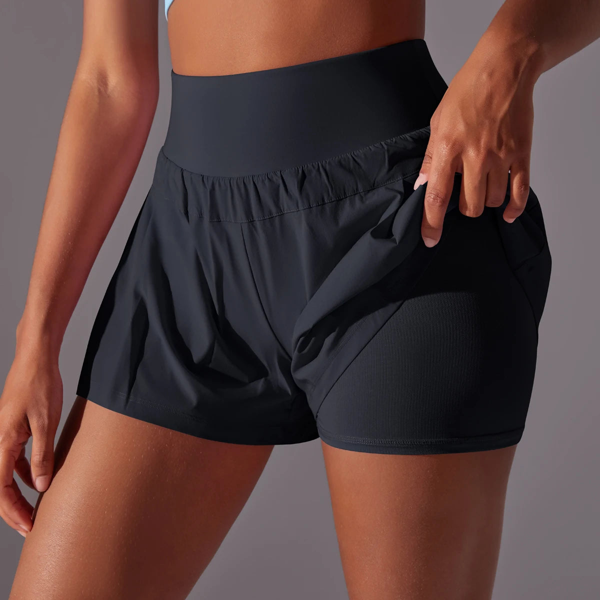 KiKis high waist women's gym shorts in black with breathable and stretchy fabric for active workouts