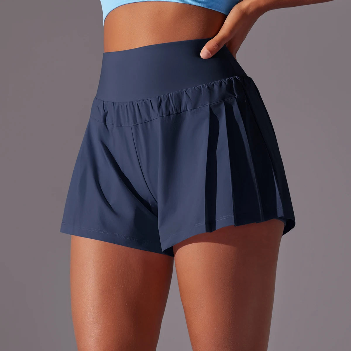 KiKis navy blue high waist women's gym shorts with pleated design and wide waistband