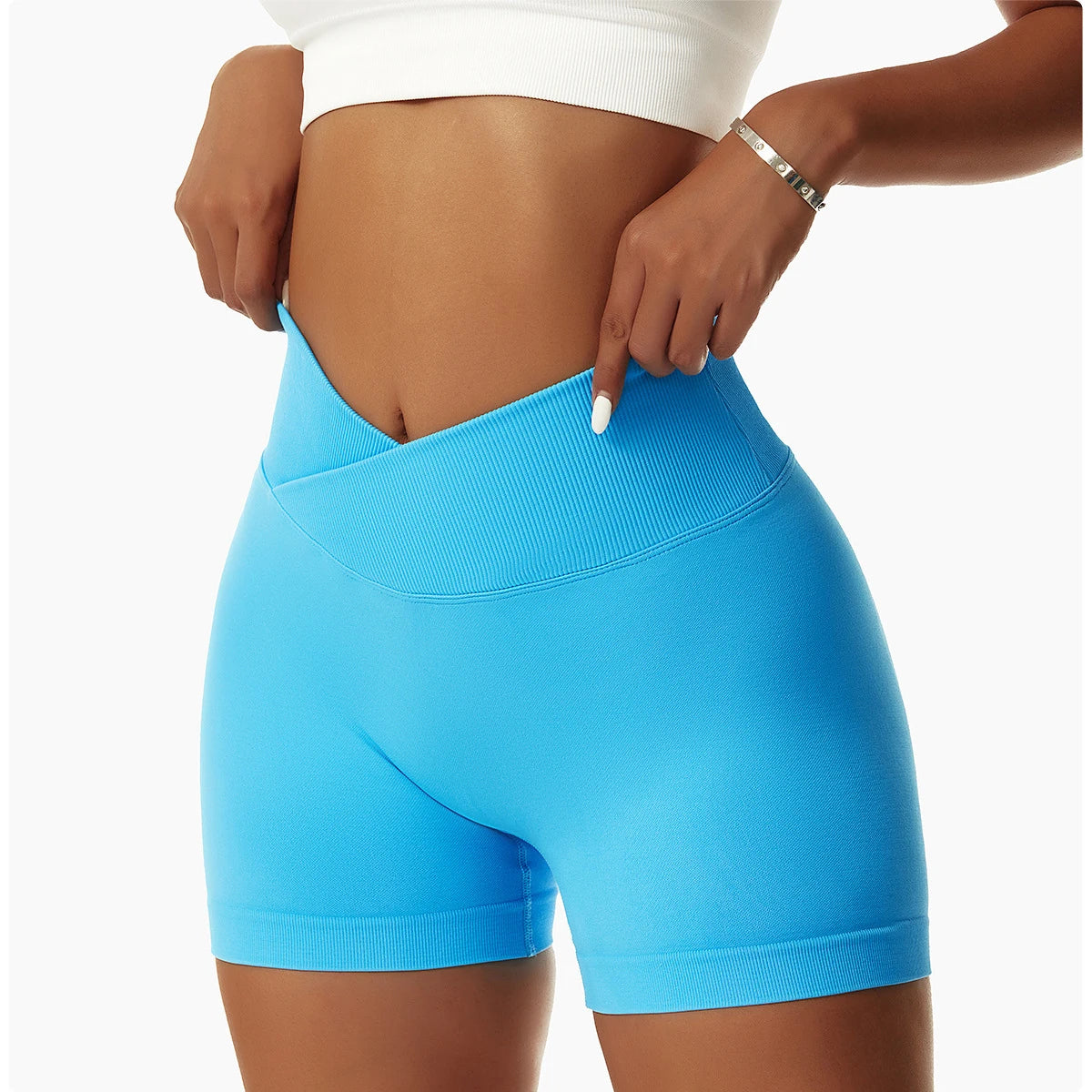 KiKis blue high waist seamless yoga shorts with ribbed waistband worn by model