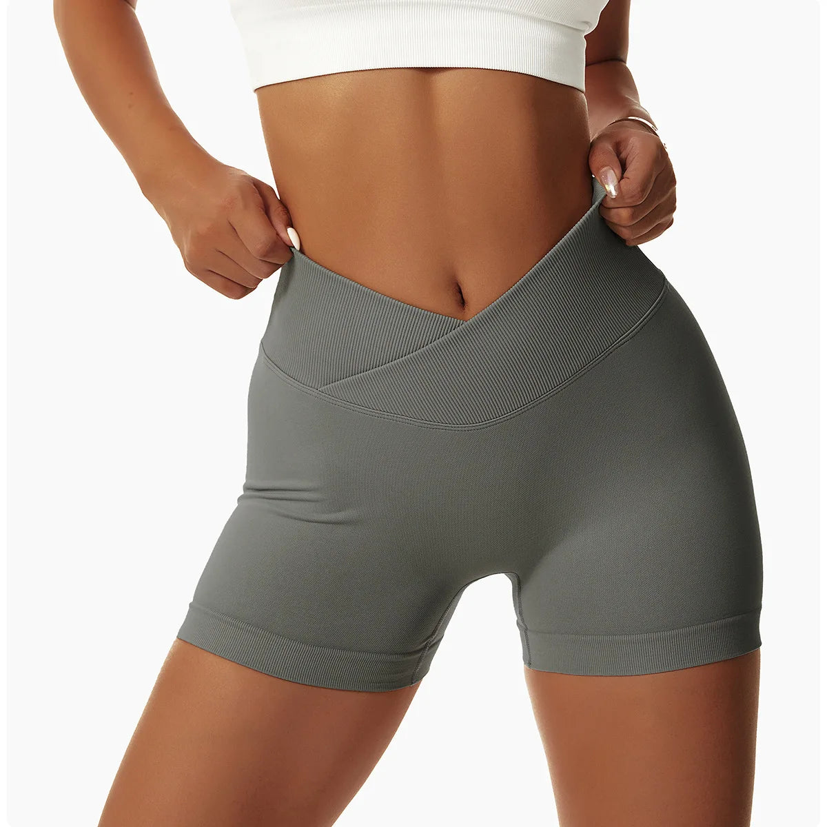 KiKis gray high waist seamless yoga shorts worn by a woman showing flexible and comfortable fit