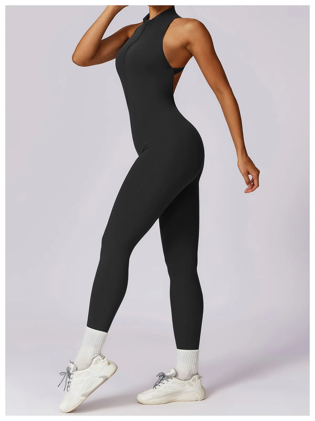 KiKis black v back one-piece yoga suit designed for flexibility and comfort during workouts