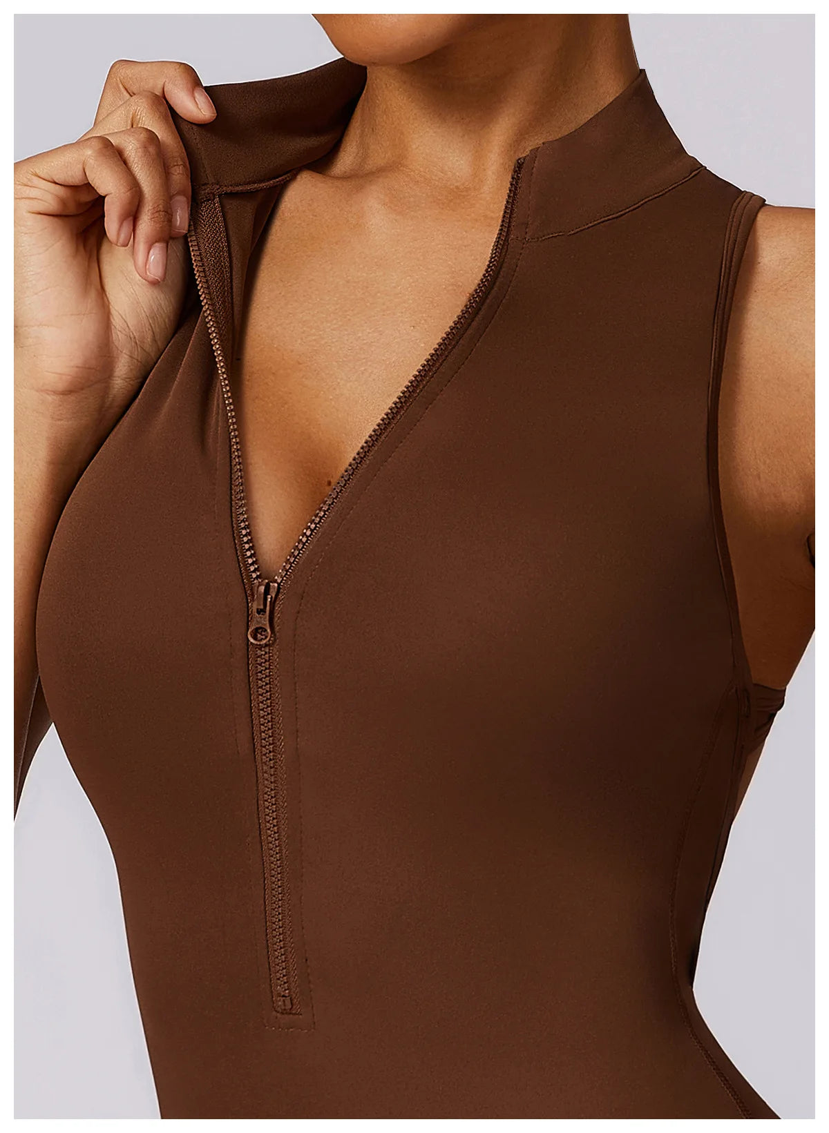 Close-up of brown v back one-piece yoga suit with front zipper by KiKis